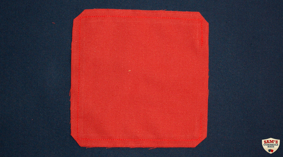 Cornhole bag with corners cut before flipping